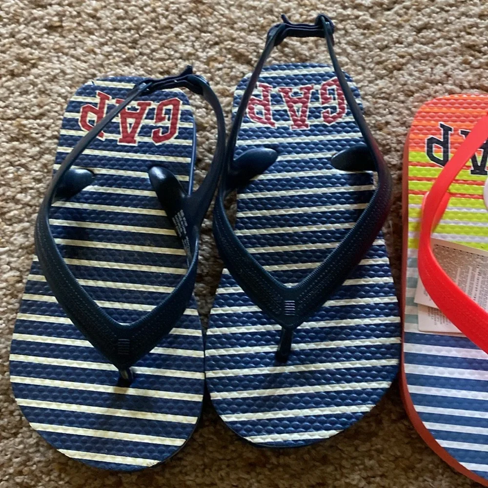 2 pairs Gap flip flops sz 10. NWOT blue/white striped. NWT neon orange striped.